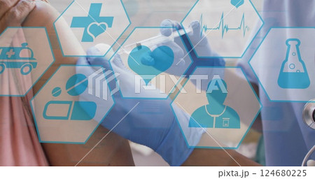 Image of medical icons over diverse female patient and doctor giving injection 124680225