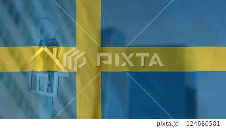 Image of silver house key over waving flag of sweden and office building Image of silver house key over waving flag of sweden and office building 124680581