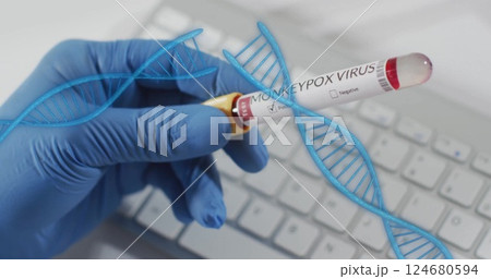 Image of dna strands spinning over hand with test tube with blood on white background Image of dna strands spinning over hand with test tube with blood on white background 124680594