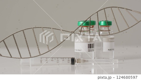 Image of dna strand spinning over vaccines and syringe on white background 124680597