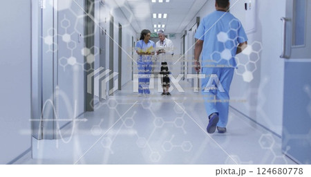 Image of data processing and chemical formula over diverse doctors walking and talking 124680778