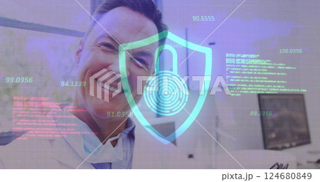 Image of data processing with padlock icon over caucasian male doctor using tablet in hospital Image of data processing with padlock icon over caucasian male doctor using tablet in hospital 124680849