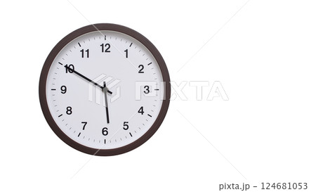 A simple round wall clock with a dark brown frame and a white face displaying 05:50/17:50. Isolated on a white background, perfect for time-related concepts, deadlines, and schedule themes. 124681053