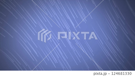 Image of glowing light trails moving over purple background 124681330