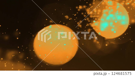 Image of glowing light spots moving over black background 124681575