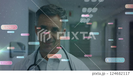 Image of media icons over caucasian male doctor writing 124682117