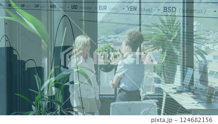 Image of financial data processing over diverse businesswomen in office 124682156