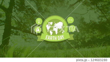 Image of earth day text over globe and grass with trees 124683280