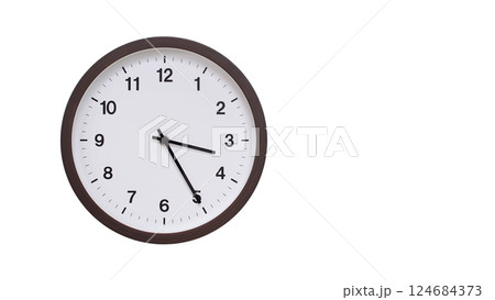 A simple round wall clock with a dark brown frame and a white face displaying 03:25/15:25. Isolated on a white background, perfect for time-related concepts, deadlines, and schedule themes. A simple round wall clock with a dark brown frame and a white face displaying 03:25/15:25. Isolated on a white background, perfect for time-related concepts, deadlines, and schedule themes. 124684373