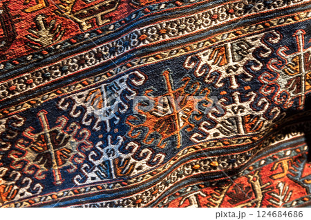 Antique Azerbaijani handmade wool carpet showing authentic patterns 124684686
