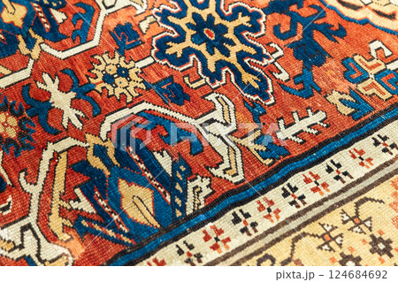 Vibrant oriental carpet showcasing detailed floral and geometric designs Vibrant oriental carpet showcasing detailed floral and geometric designs 124684692