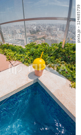 Refreshing summer drink by the pool on a sunny day 124685739