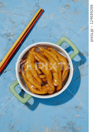 asian boneless chicken feet in a ceramic casserole asian boneless chicken feet in a ceramic casserole 124689266
