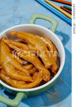 asian chicken feet coated in gelatin in a casserole 124689267