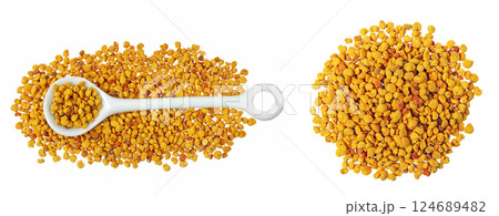 Bee pollen grains in ceramic spoon isolated on white background. Top view. Flat lay 124689482