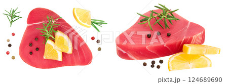 Fresh tuna fish fillet steak with rosemary, lemon and peppercorns isolated on white background . Top view. Flat lay Fresh tuna fish fillet steak with rosemary, lemon and peppercorns isolated on white background . Top view. Flat lay 124689690