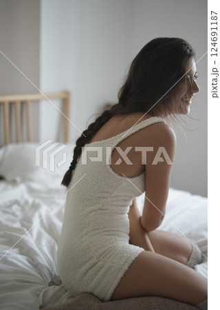 A Relaxed Morning Mood in a Cozy Bedroom Setting that Embraces Comfort and Serenity A Relaxed Morning Mood in a Cozy Bedroom Setting that Embraces Comfort and Serenity 124691187