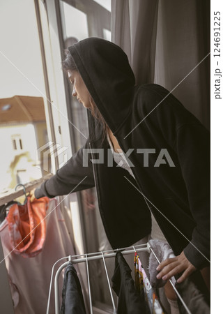 Effortless and casual indoor laundry drying can bring a sense of comfort and style to your space 124691225