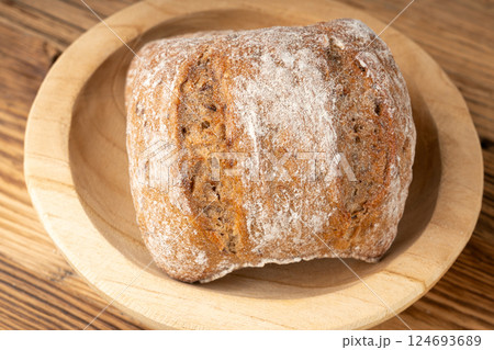Brown rye bun, square gluten free bread, whole grain healthy breakfast bread 124693689