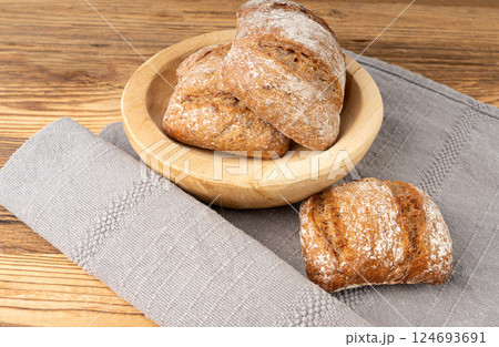 Brown rye bun, square gluten free bread, whole grain healthy breakfast bread 124693691