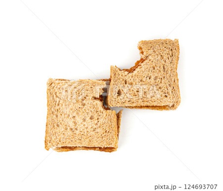 Bitten dried pate sandwich isolated, low-quality food leftovers, bad quality toast bread lunch 124693707