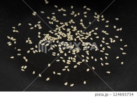 Sesame seeds, white small benne grains, Sesamum indicum fruits 124693734