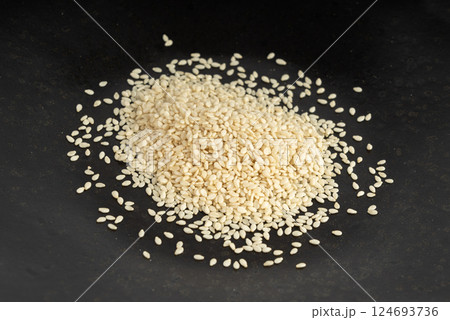 Sesame seeds, white small benne grains, Sesamum indicum fruits 124693736