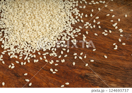 Sesame seeds, white small benne grains, Sesamum indicum fruits Sesame seeds, white small benne grains, Sesamum indicum fruits 124693737
