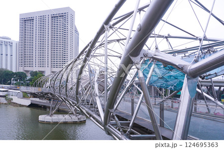 Helix Bridge that links the Marina Center and Bayfront areas. iconic bridge in Singapore Helix Bridge that links the Marina Center and Bayfront areas. iconic bridge in Singapore 124695363