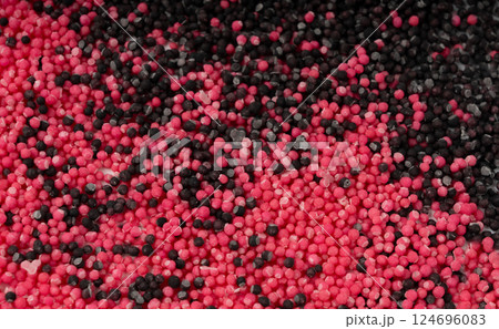 Candy sprinkle pile, round sugar sprinkles, small sweet color confectionery decoration balls Candy sprinkle pile, round sugar sprinkles, small sweet color confectionery decoration balls 124696083