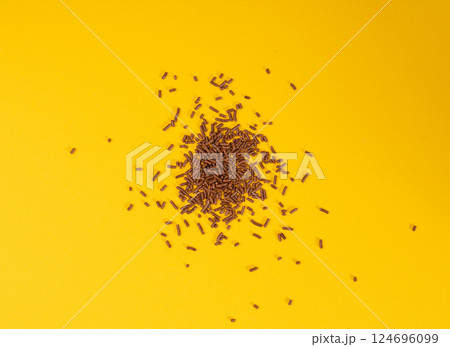 Chocolate Sprinkle Pile, Candy Sprinkles Flakes, Sweet Brown Flakes Glaze Decoration, Chocolate Vermicelli Chocolate Sprinkle Pile, Candy Sprinkles Flakes, Sweet Brown Flakes Glaze Decoration, Chocolate Vermicelli 124696099