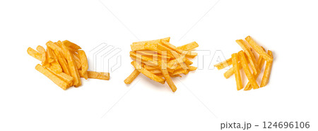 Fried chips sticks isolated, finger potato chips, golden shoestring fries pile, French fries Fried chips sticks isolated, finger potato chips, golden shoestring fries pile, French fries 124696106