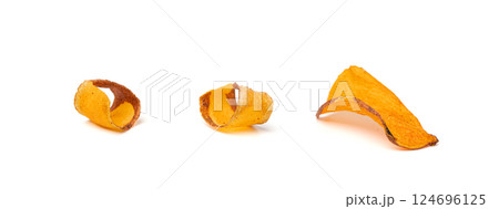 Dry sweet potato chips isolated, dried sliced red vegetable, healthy crispy snack flakes pile 124696125