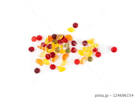 Fruit gummy candy pile isolated, vegan chewing marmalade pills, jelly gumdrops heap Fruit gummy candy pile isolated, vegan chewing marmalade pills, jelly gumdrops heap 124696154