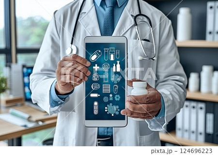 Male physician holding healthcare icons for health insurance concept in hospital setting Male physician holding healthcare icons for health insurance concept in hospital setting 124696223