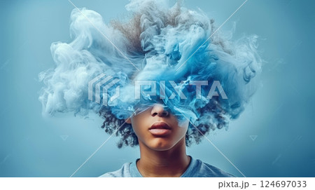 Young Person with Afro Hair Surrounded by Blue Smoke, Abstract Creativity and Imagination Concept 124697033