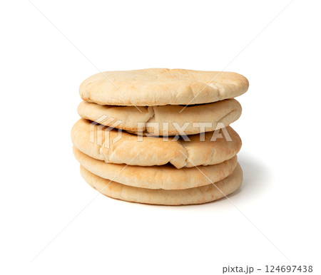 Pita flat bread, wheaten pitta flatbread also known as Arabic bread, chapati, greek pita naan, khubz Pita flat bread, wheaten pitta flatbread also known as Arabic bread, chapati, greek pita naan, khubz 124697438