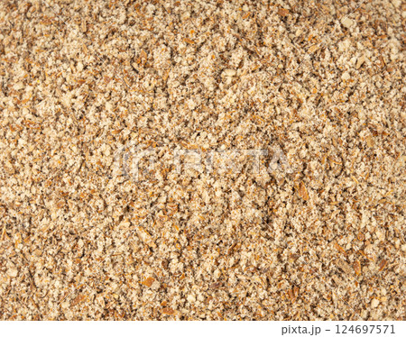 Milk thistle seeds powder, crushed silybum marianum grains pile, milled dry blessed milkthistle Milk thistle seeds powder, crushed silybum marianum grains pile, milled dry blessed milkthistle 124697571