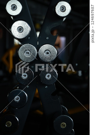 Dumbbells in Gym Close-Up View Dumbbells in Gym Close-Up View 124697687