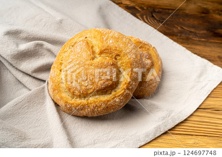 Heart on Wheat Bread, Heart Shaped Bun on Wooden Table 124697748