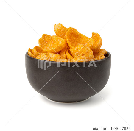 Hummus chickpea chips, chick pea crisps pile, healthy orange snack, fried legume crunchies 124697825
