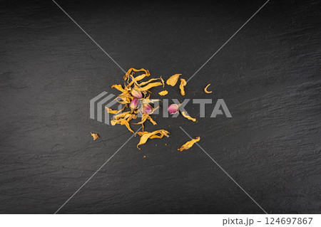Dried edible flowers mix, Helichrysum arenarium pile, dwarf everlast petals, medical herb tea pile 124697867