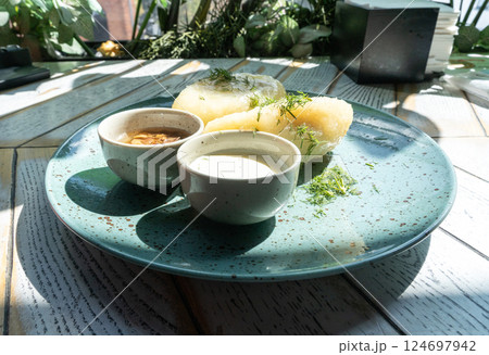 Lithuanian potato dumplings, cepelinai pancakes or kolduny, meat stuffed draniki, traditional didzkukuliai 124697942