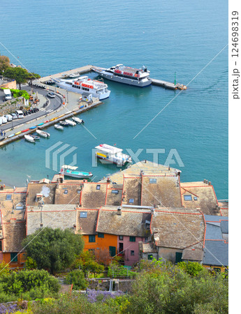 Yachts, boats in bay of Porto Venere, Liguria. Sea and tourism in Italy. Traditional buildings. Background for design. Yachts, boats in bay of Porto Venere, Liguria. Sea and tourism in Italy. Traditional buildings. Background for design. 124698319