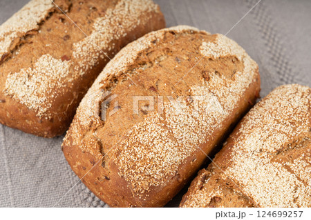 Whole wheat brown bread, fitness pumpkin carrot buns with seeds, cereal bread grain bun 124699257