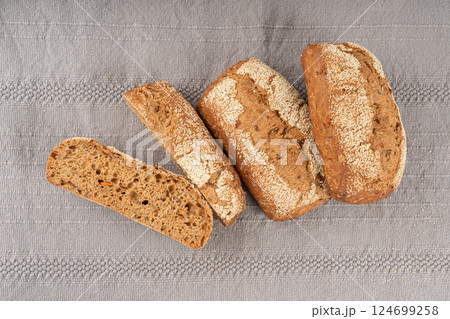 Whole wheat brown bread, fitness pumpkin carrot buns with seeds, cereal bread grain bun 124699258