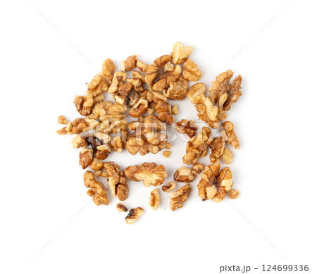 Chopped wallnut , broken roasted walnuts powder, heap of nuts crumbs, whole kernel pieces Chopped wallnut , broken roasted walnuts powder, heap of nuts crumbs, whole kernel pieces 124699336