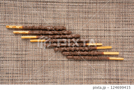 Chocolate cookie sticks, long choco pastries, japan biscuit tubes, korea cracker sticks 124699415