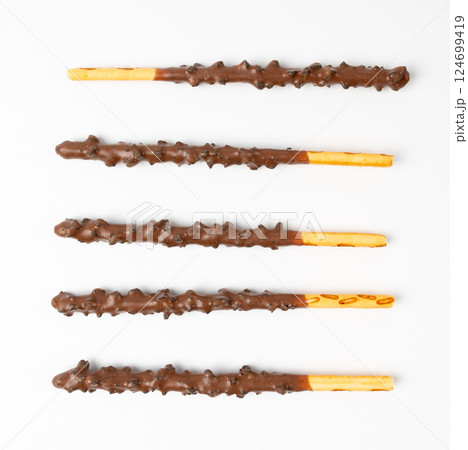 Chocolate cookie sticks, long choco pastries, japan biscuit tubes, korea cracker sticks Chocolate cookie sticks, long choco pastries, japan biscuit tubes, korea cracker sticks 124699419