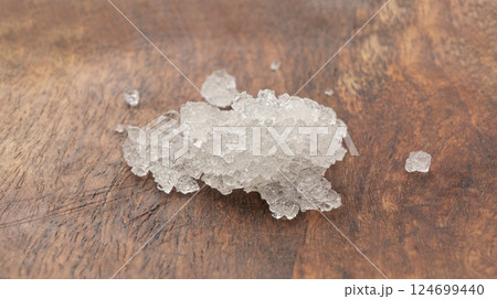 Dead sea salt pile, white crystals for body spa, sodium chloride similar to crushed ice, spa scrub Dead sea salt pile, white crystals for body spa, sodium chloride similar to crushed ice, spa scrub 124699440